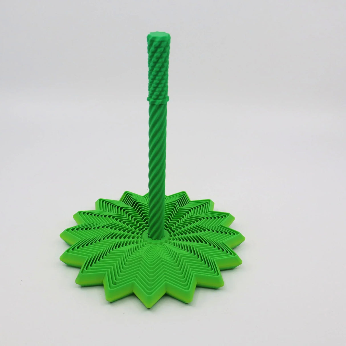 Green 3D printed sensory toy with star-shaped base and textured vertical stick
