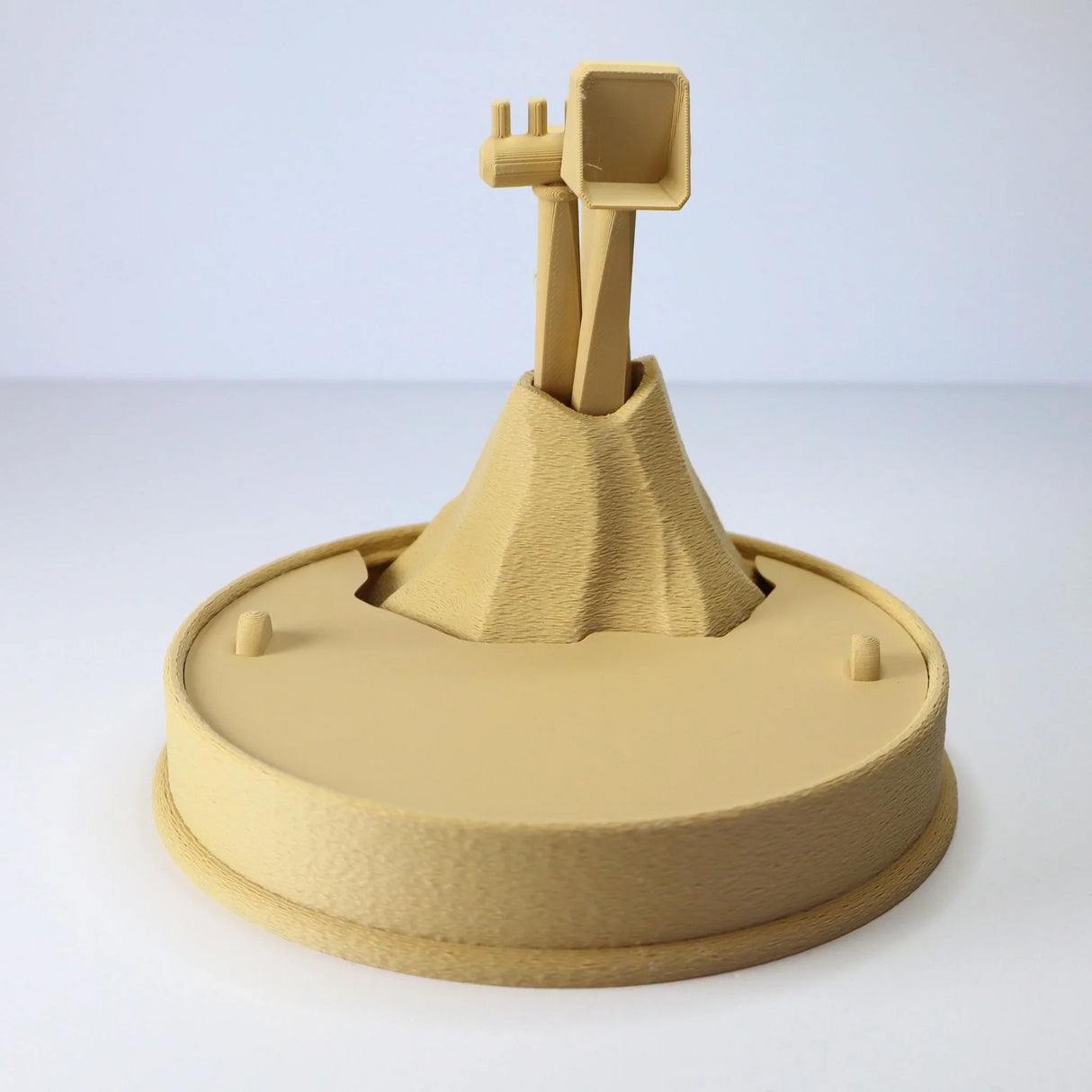3D printed sensory toy volcano with periscope on circular base for kids