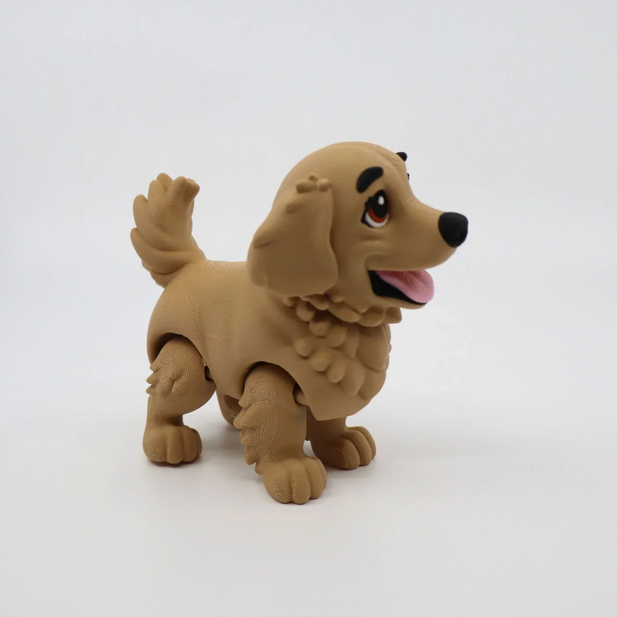 3D printed flexi dog toy for sensory play, featuring movable joints and cheerful expression