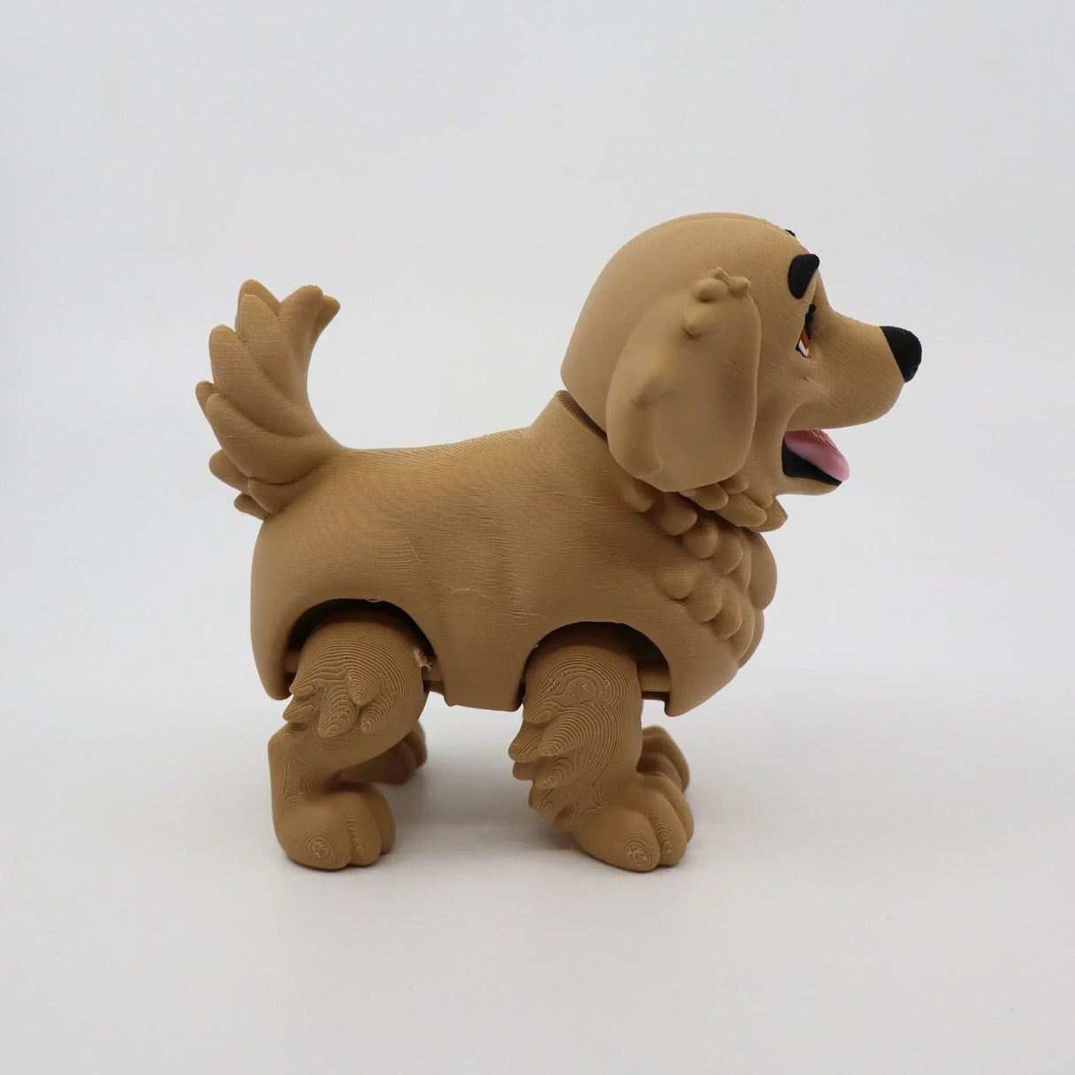 3D printed golden retriever fidget toy for sensory play, featuring flexible joints and textured fur