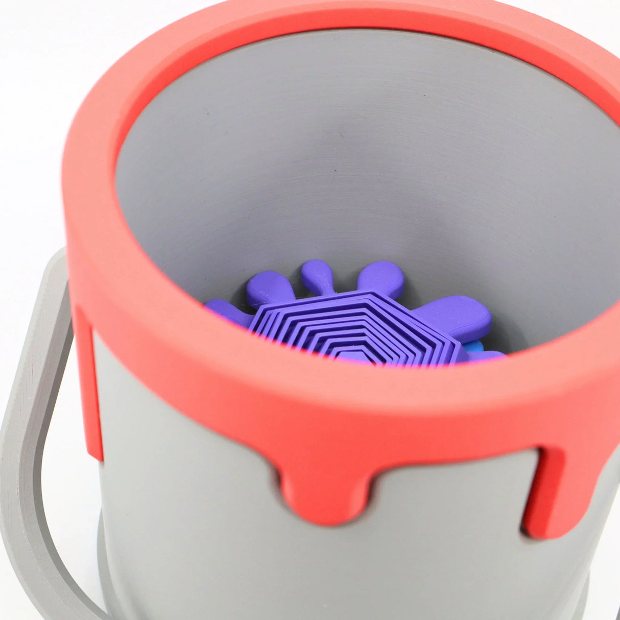 3D printed paint can toy with purple sensory insert for sensory seeking children