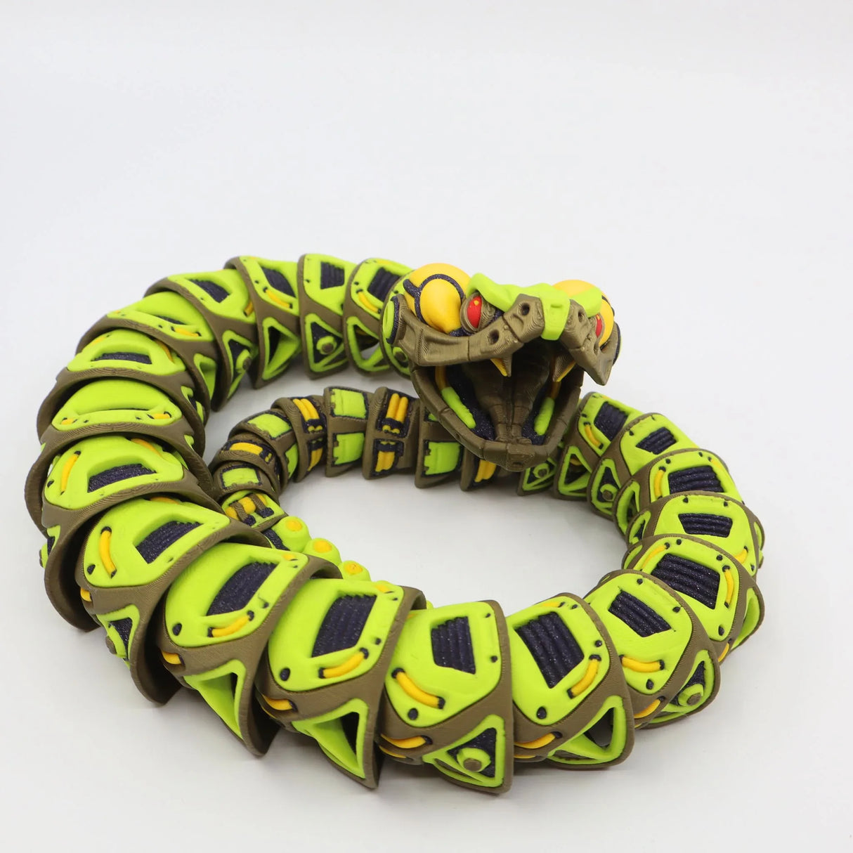 3D printed sensory snake toy with flexible neon green, brown, and yellow segments