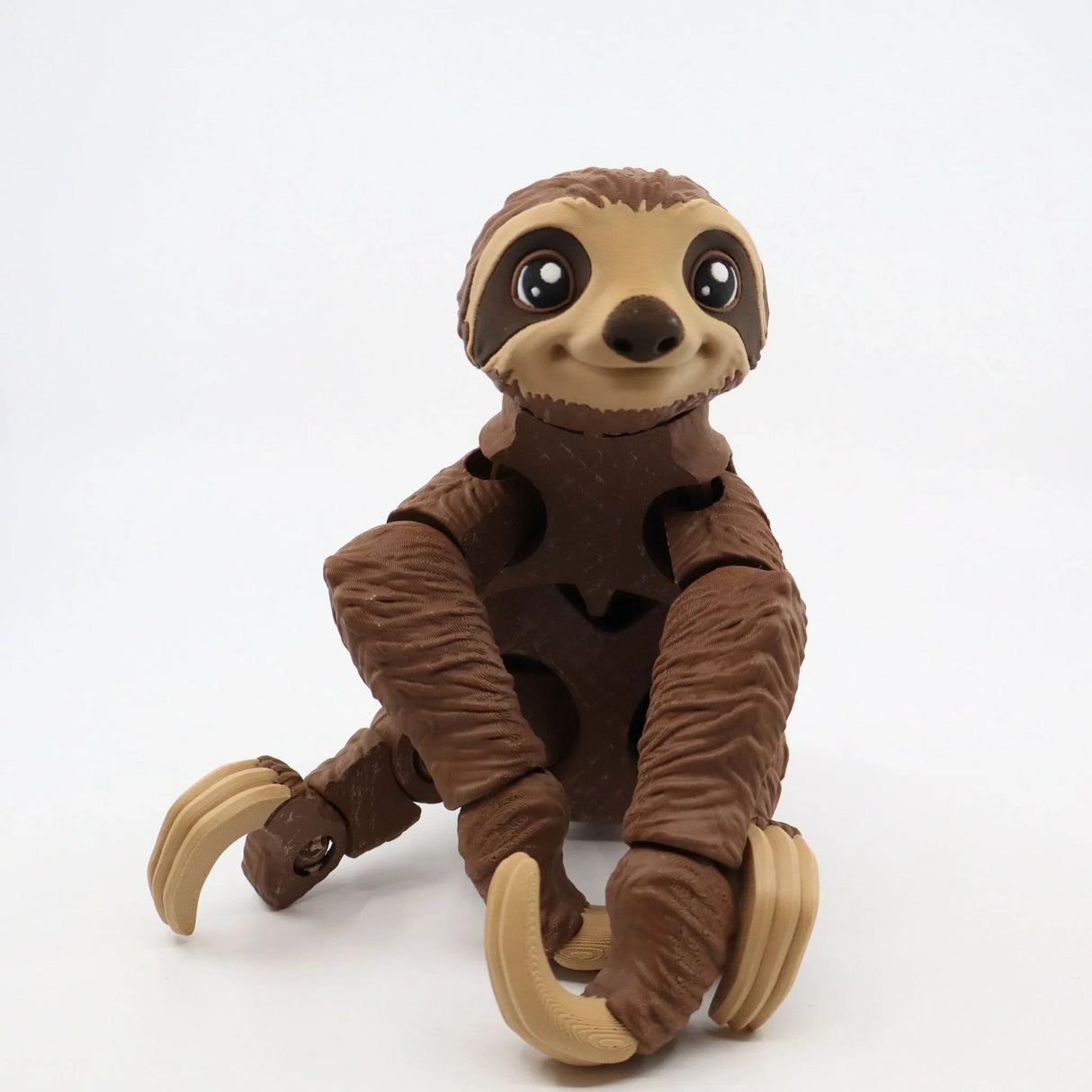 3D printed brown sloth sensory toy with flexible limbs and textured surface, on white background.