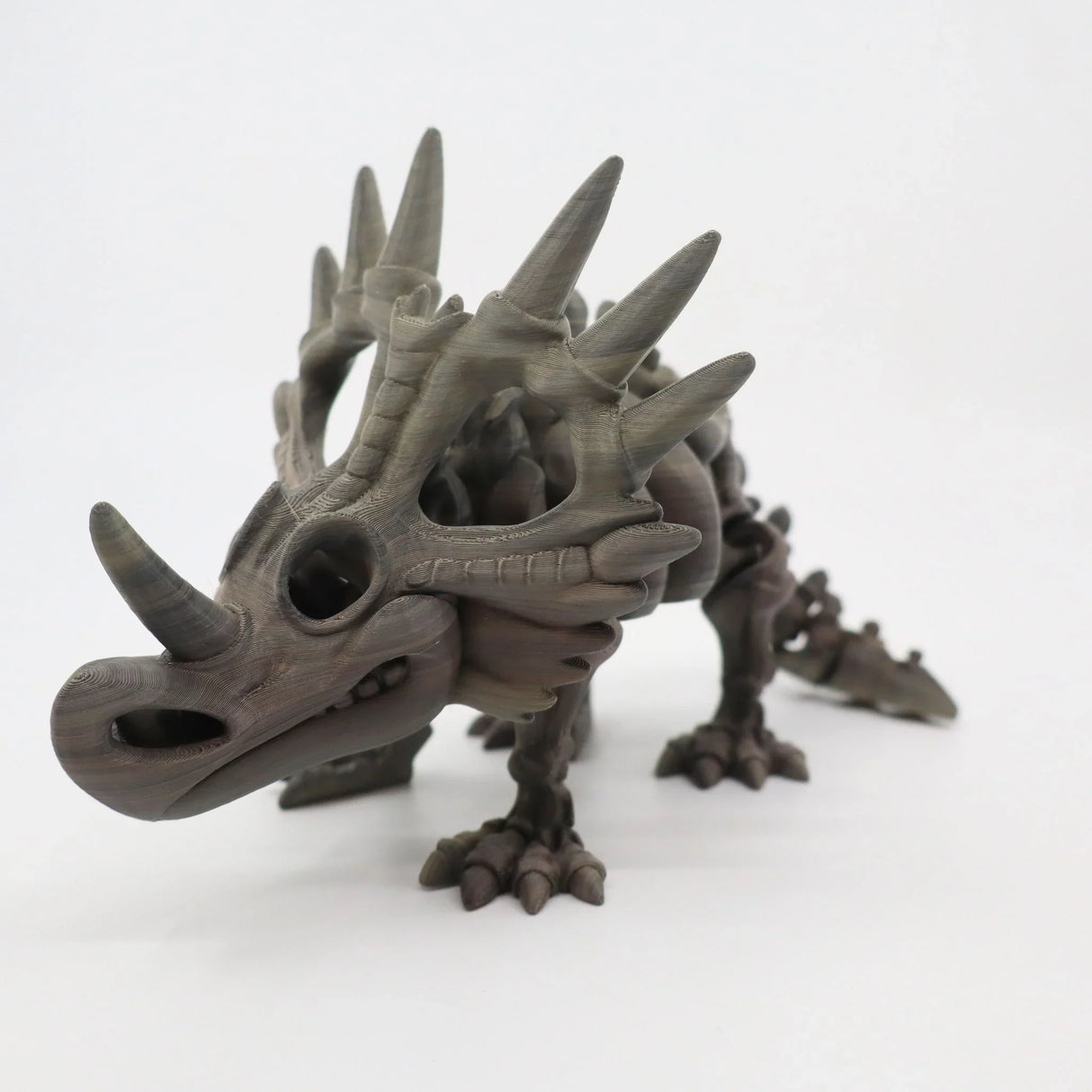 3D printed Styracosaurus dinosaur toy with detailed spikes, sensory stem educational figurine