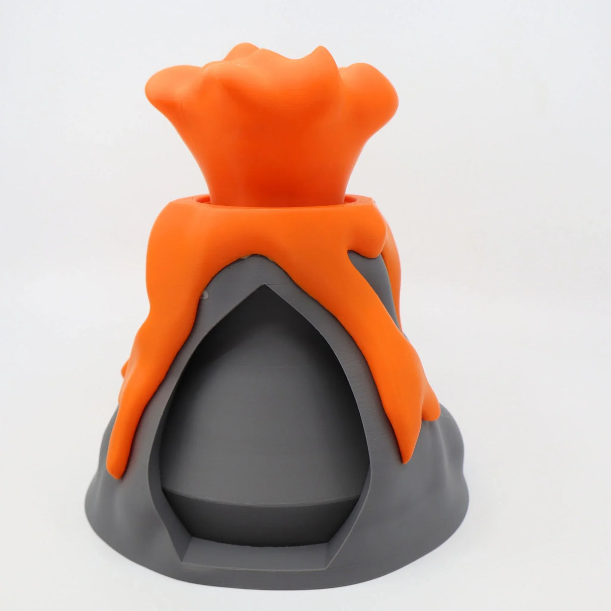 3D printed sensory volcano toy with bright orange lava, educational and tactile design