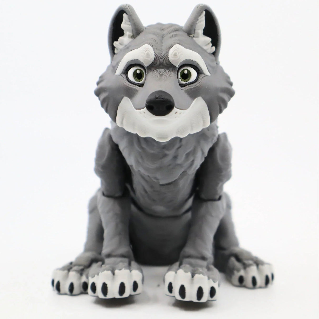 3D printed gray wolf sensory toy with movable joints, sitting on a white background