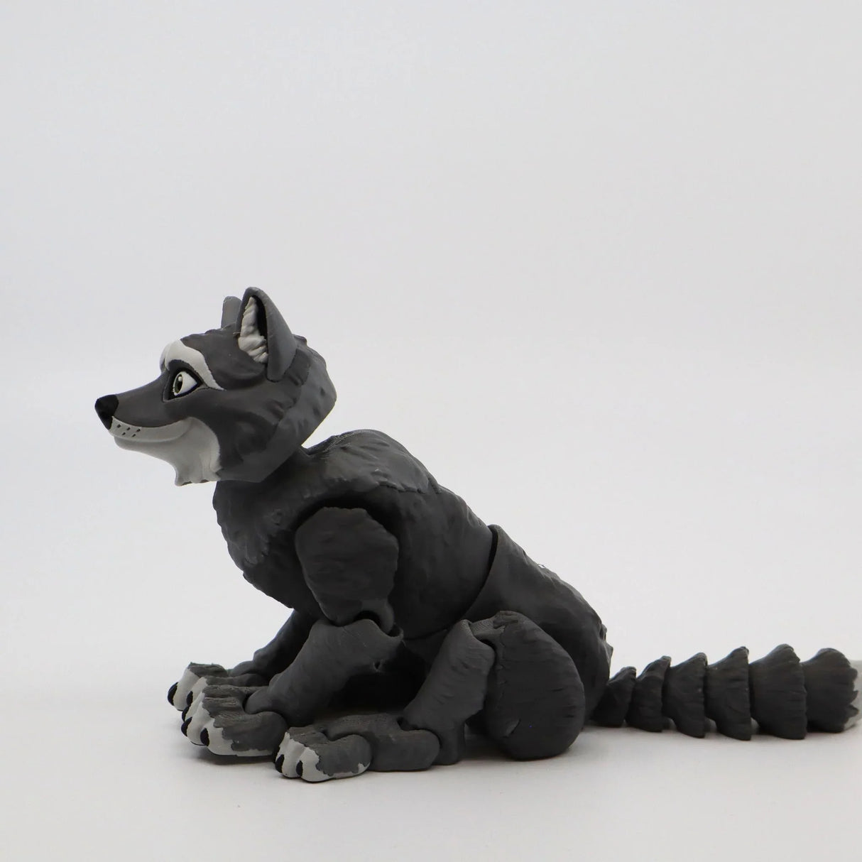 3D printed gray wolf sensory toy with detailed face and textured body on white background
