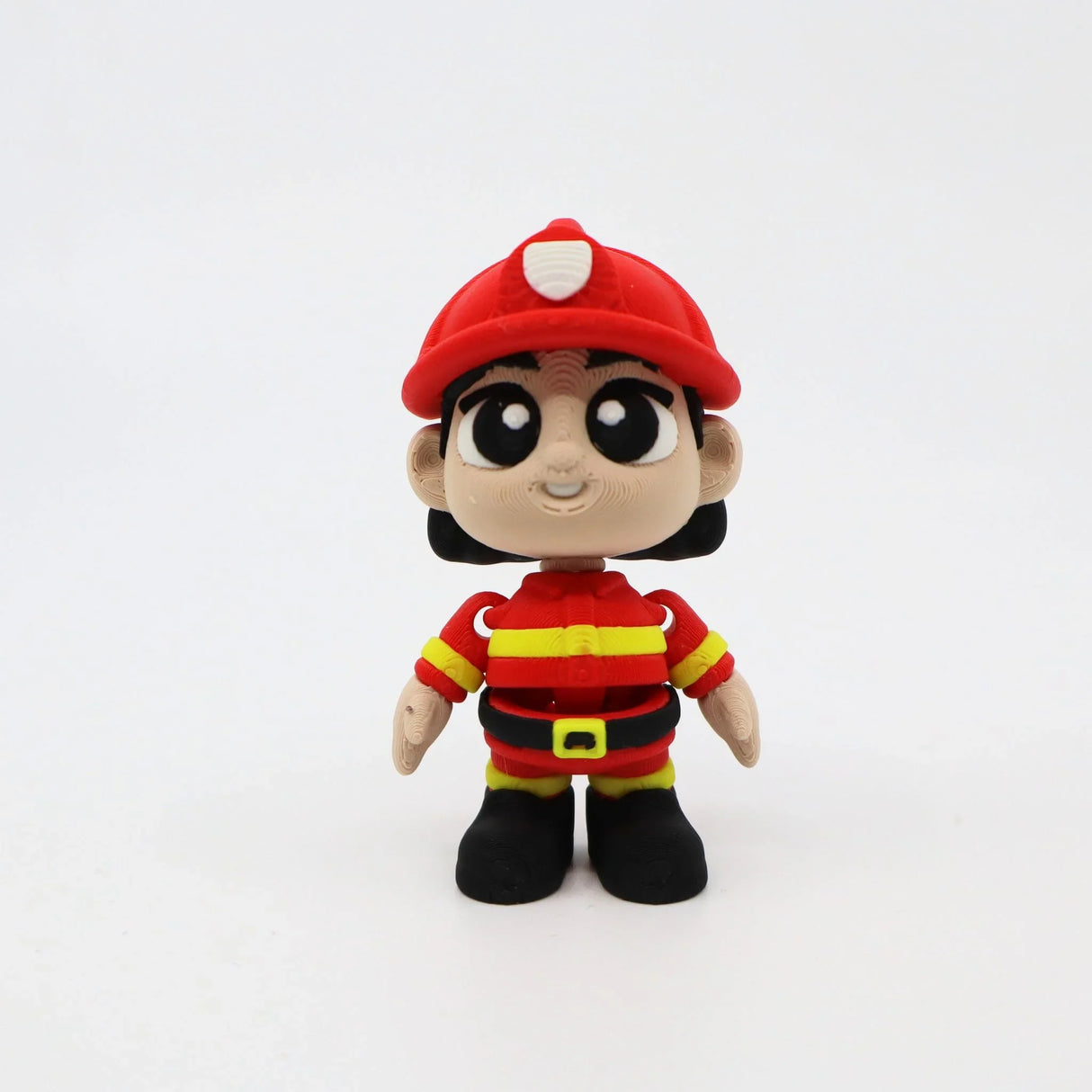 3D printed firefighter toy for sensory play, educational fidget with bold red and yellow details
