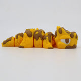 Yellow and brown 3D printed sensory fidget caterpillar toy with segmented body