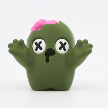 Green 3D printed zombie sensory toy with raised arms and exposed pink brain