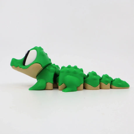 Green 3D printed flexi alligator fidget toy for sensory play and tactile stimulation