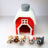 Colorful sensory barn toy with spinning door and five cute animal figurines in front
