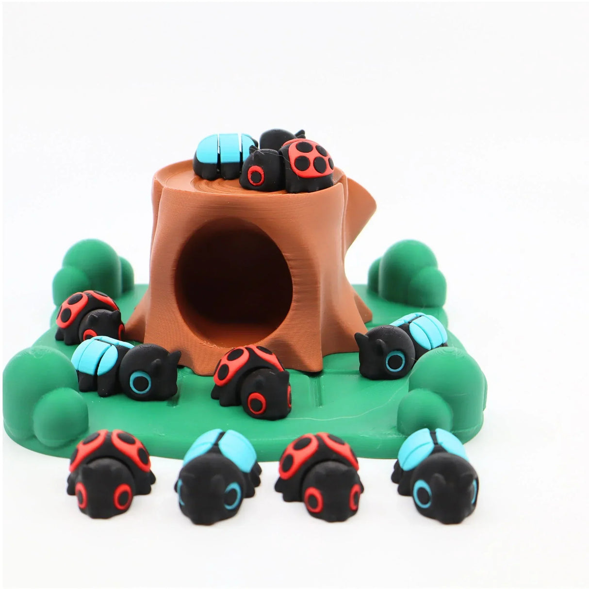 3D printed sensory toy set with colorful ladybugs and tree stump for tactile play