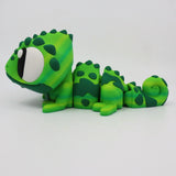 Colorful 3D printed chameleon sensory toy with green and yellow stripes on white background
