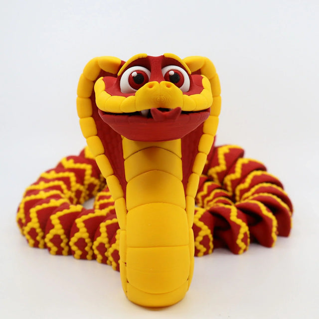 Colorful 3D printed sensory cobra toy, red and yellow, flexible and playful design