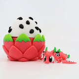 3D printed dragon fruit sensory toy with a cute pink dragon figure beside a dragon fruit egg.