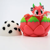 3D printed pink dragon fruit toy with adorable dragon figure hatching from spotted egg