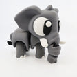 Cute gray 3D printed elephant sensory toy with big eyes and movable trunk on white background