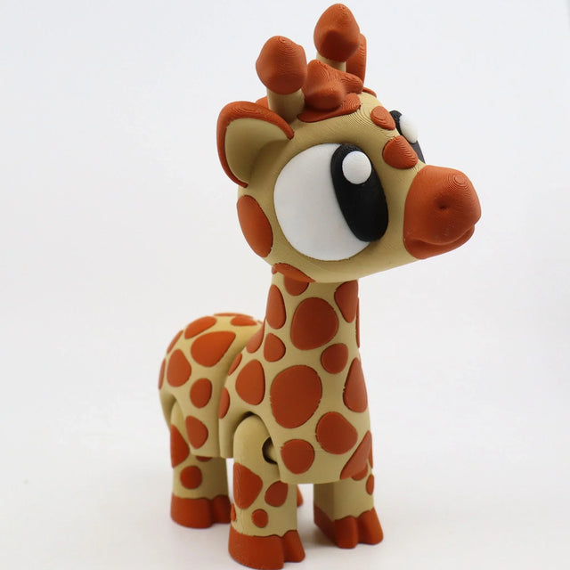 3D printed sensory giraffe toy with orange spots and large eyes on white background
