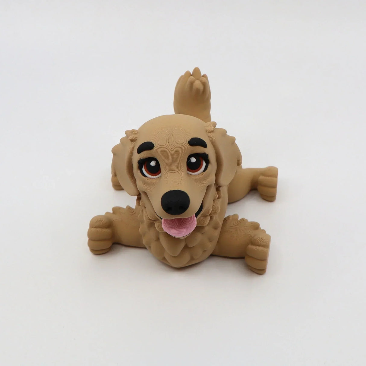 3D printed golden retriever fidget toy with expressive eyes and pink tongue, sensory-friendly design