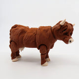 3D printed Highland cow sensory toy with jointed legs, brown fur texture, white background