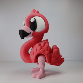 3D printed pink flamingo sensory toy with large eyes, designed for sensory-seeking kids