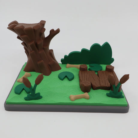 3D printed sensory toy with tree, logs, and bones for tactile play and learning