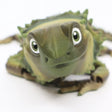 3D printed green sensory toy lizard with textured details on white background