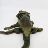 3D printed sensory toy lizard with flexible limbs, green and brown, on white background