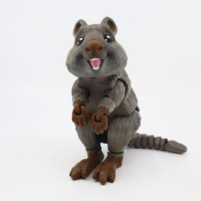3D printed brown quokka sensory toy with articulated limbs and smiling face on white background.