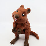 Cute brown 3D printed quokka sensory toy with articulated limbs on white background