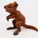 Brown 3D printed quokka sensory toy with flexible joints on a white background