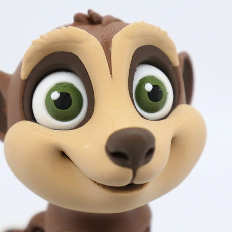 3D printed meerkat sensory toy with large green eyes and a friendly smile