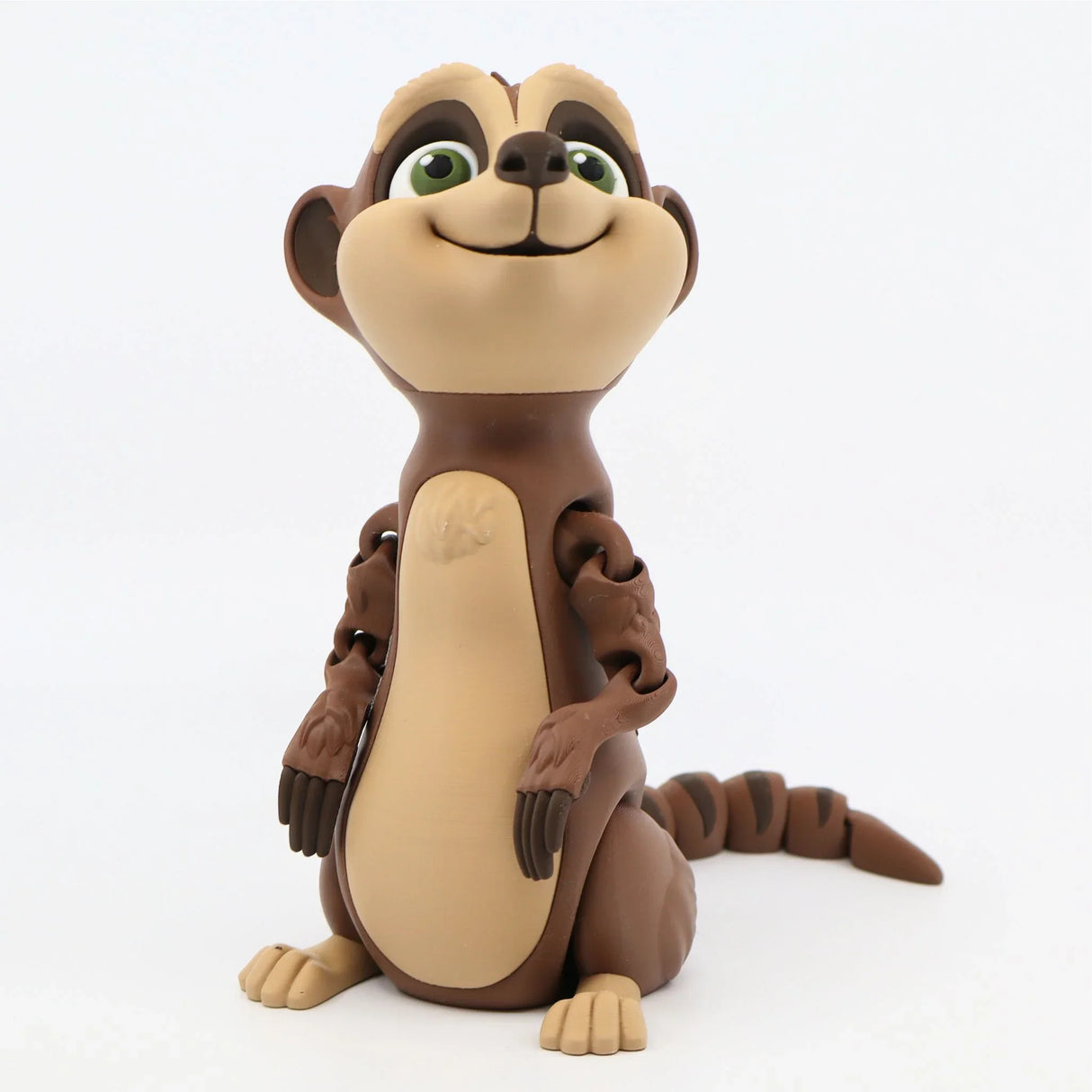 3D printed brown meerkat sensory toy with articulated limbs and green eyes, on white background.