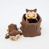 3D printed brown owl sensory toy set with owls and a tree stump on white background