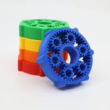 Colorful 3D printed sensory gears stacking toy for kids, featuring blue, green, yellow, and red wheels
