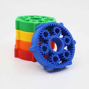 Colorful 3D printed sensory gears stacking toy for kids, featuring blue, green, yellow, and red wheels