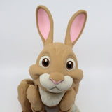 3D printed brown rabbit sensory toy with big eyes and pink ears on white background