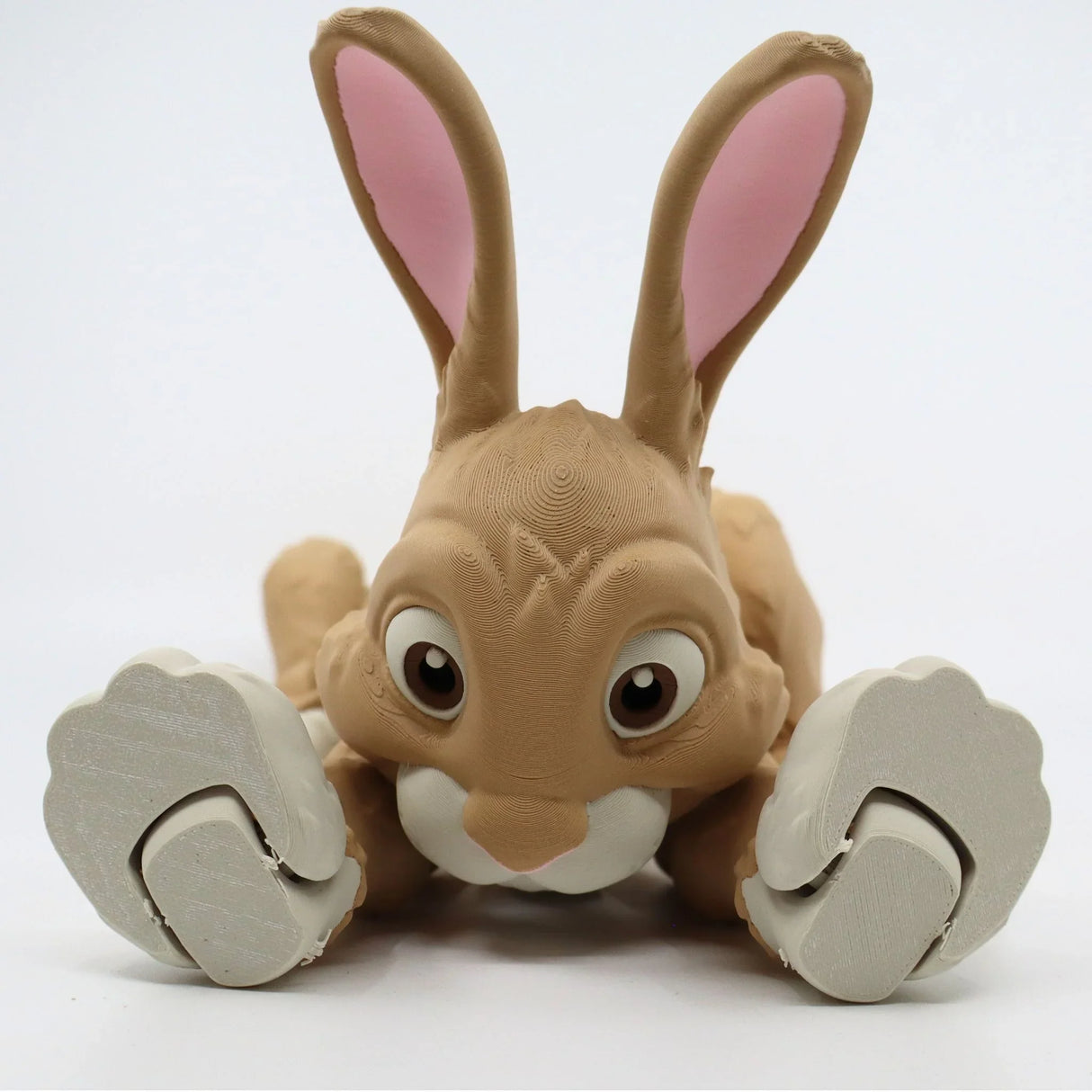 Cute 3D printed rabbit sensory toy with flexible paws and big eyes on white background