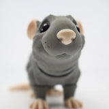 Gray 3D printed rat sensory toy with big eyes and detailed texture on a white background