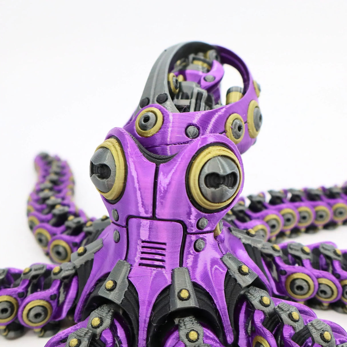 Purple 3D printed flexi octopus fidget toy with articulated tentacles for sensory play