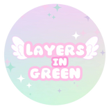 Layers in Green pastel logo with winged text and sparkles for sensory toys