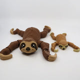 Two 3D printed sensory sloth toys with jointed limbs on a white background