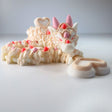 3D printed sensory dragon toy with pastel heart details, ideal for sensory play