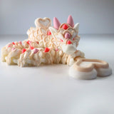 3D printed sensory dragon toy with pastel heart details, ideal for sensory play