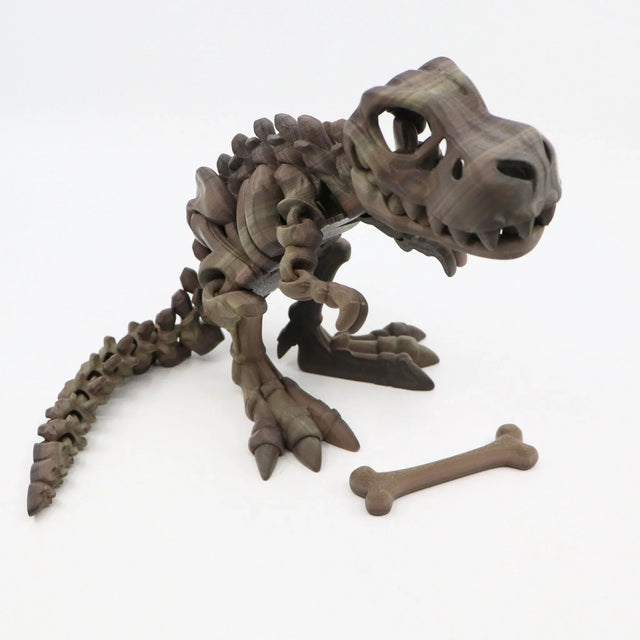 3D printed T-Rex dinosaur sensory toy with realistic bones on a white background