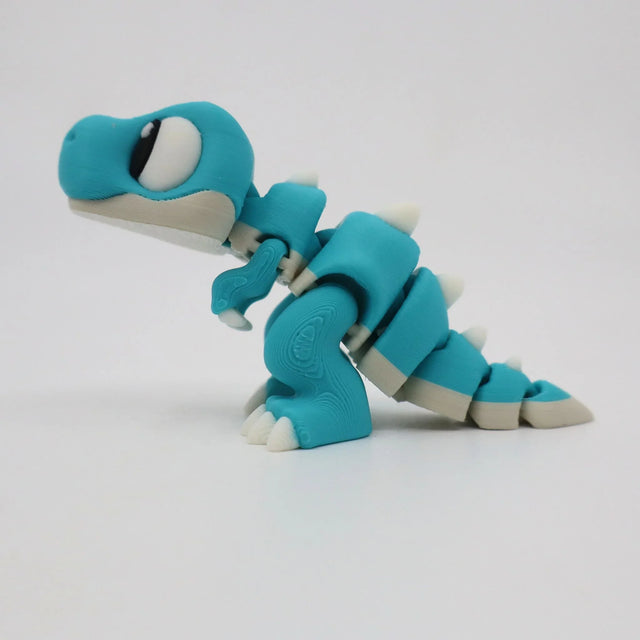 Blue and white 3D printed flexible dinosaur sensory toy for children on white background