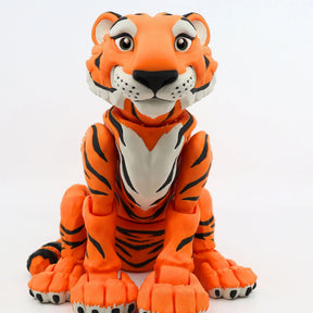 Colorful 3D printed tiger sensory toy with flexible joints on a white background
