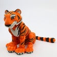 3D printed orange tiger sensory toy with flexible joints on white background