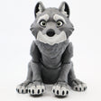 3D printed gray wolf sensory toy with movable joints, sitting on a white background